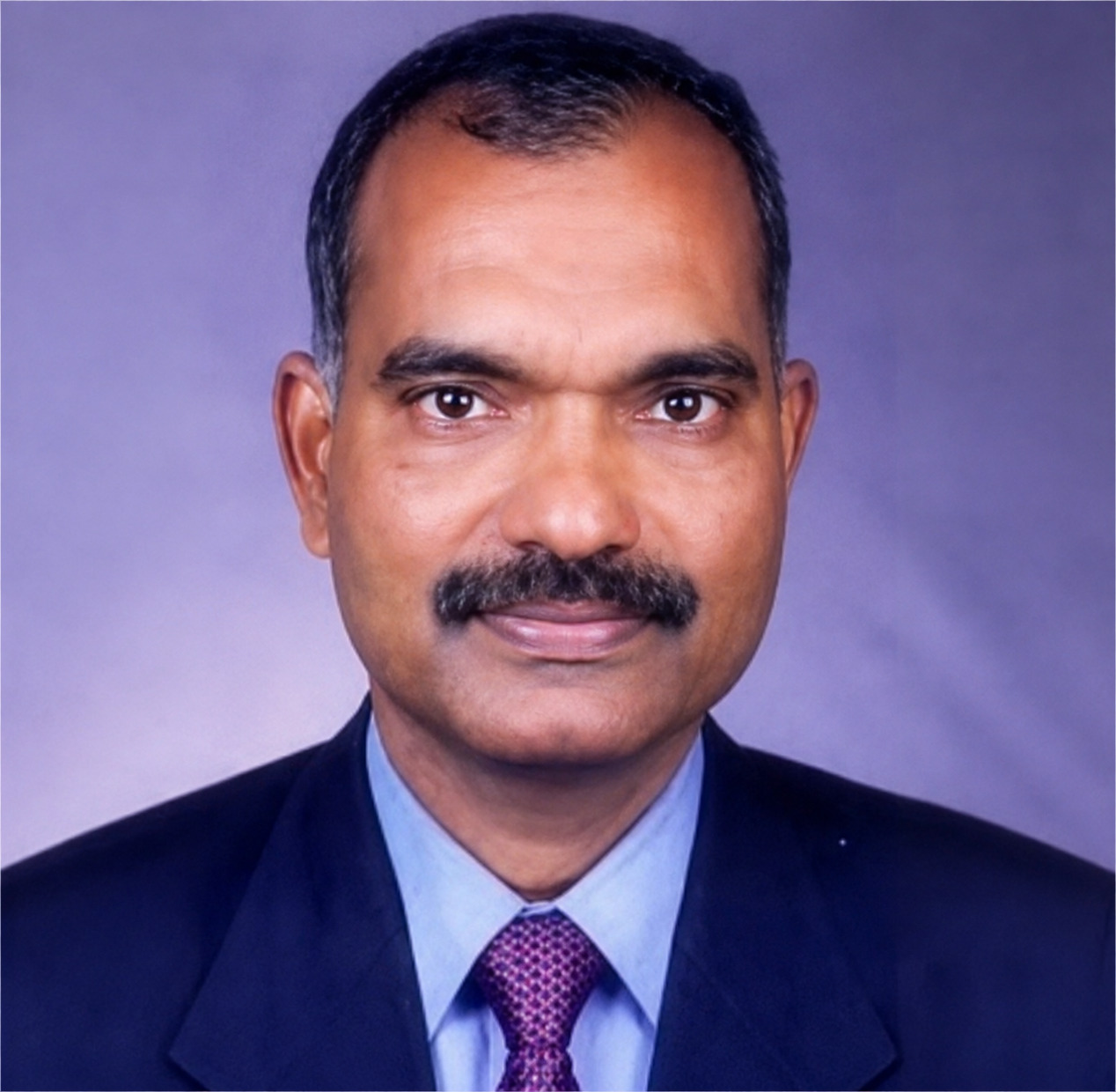 Dr. P.J.John